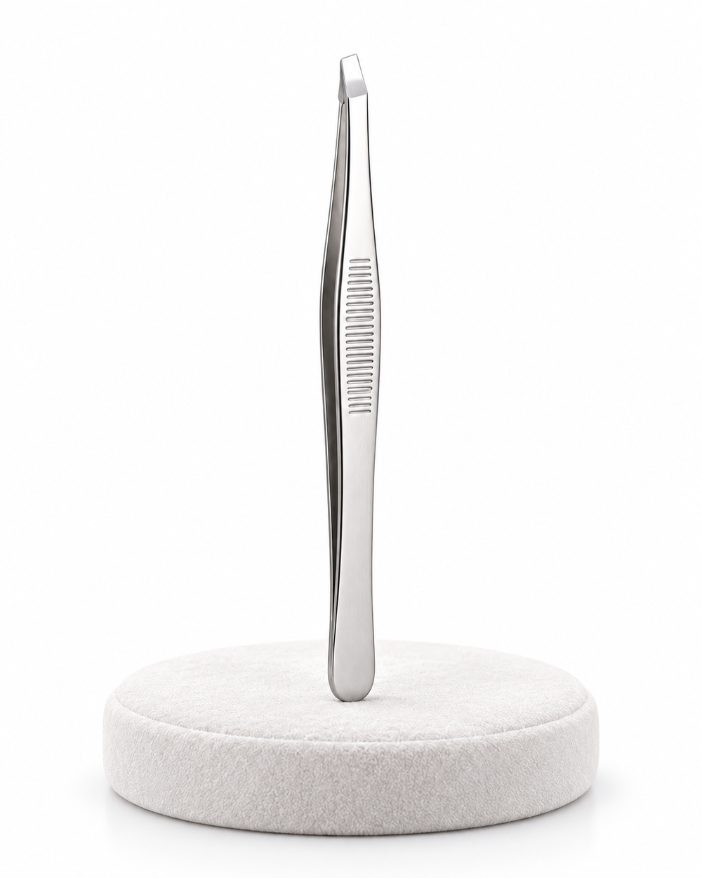 silver-colored stainless steel eyebrow tweezer