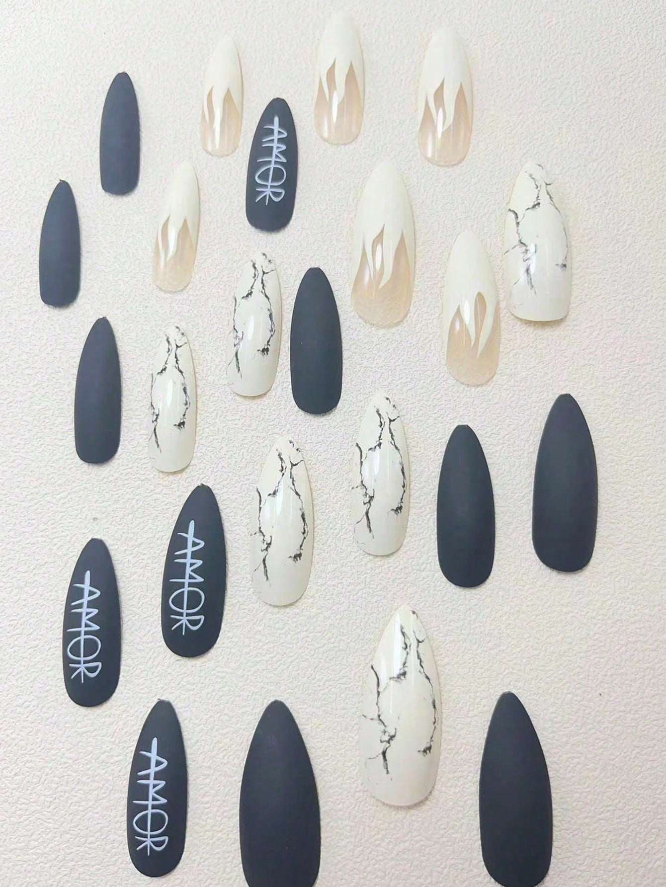 Shein 24 pieces of flame-themed stiletto nails with a white letter design