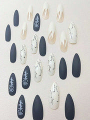 Shein 24 pieces of flame-themed stiletto nails with a white letter design