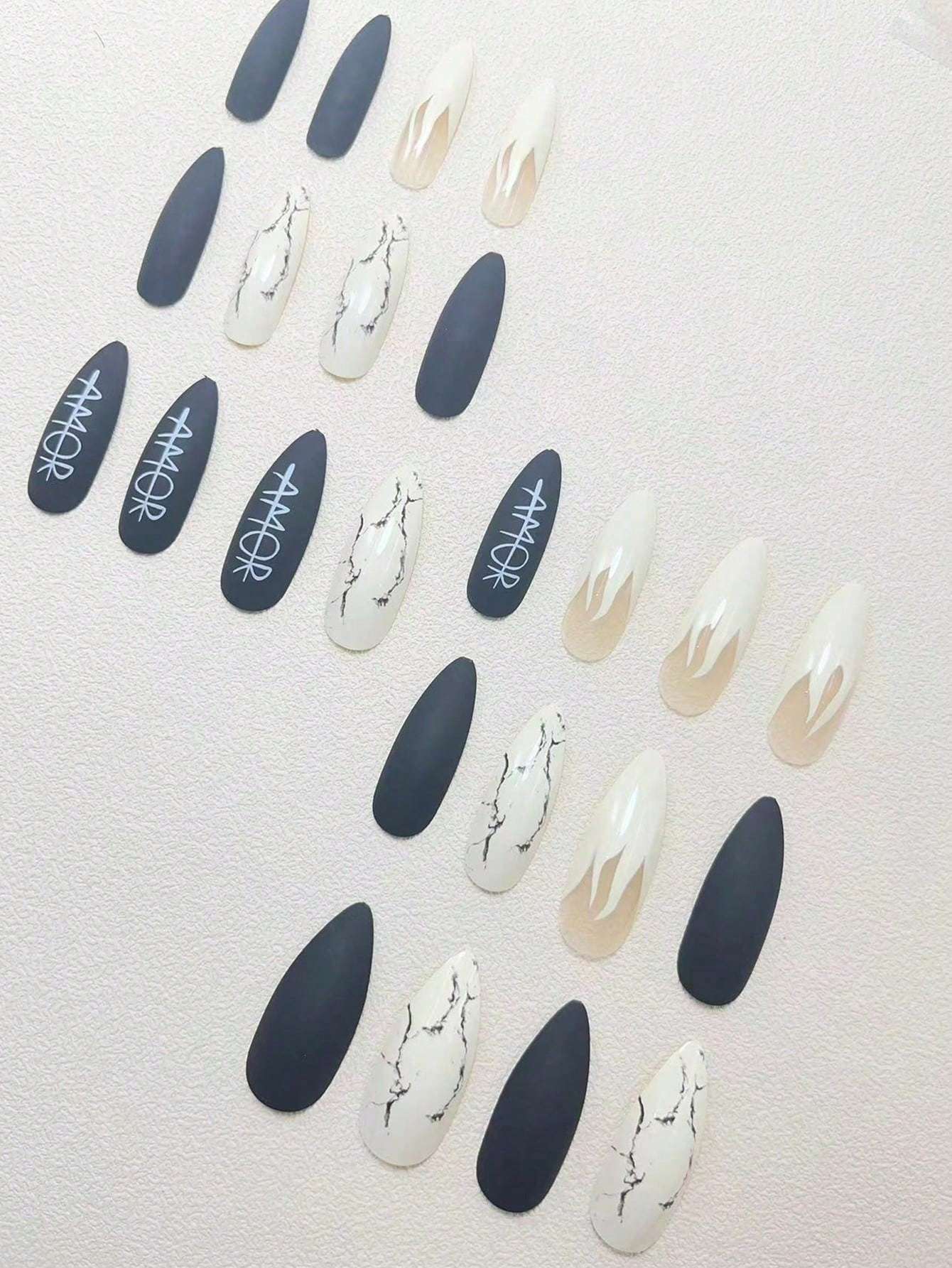 Shein 24 pieces of flame-themed stiletto nails with a white letter design