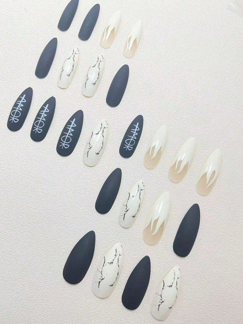 Shein 24 pieces of flame-themed stiletto nails with a white letter design