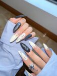 Shein 24 pieces of flame-themed stiletto nails with a white letter design