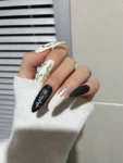 Shein 24 pieces of flame-themed stiletto nails with a white letter design